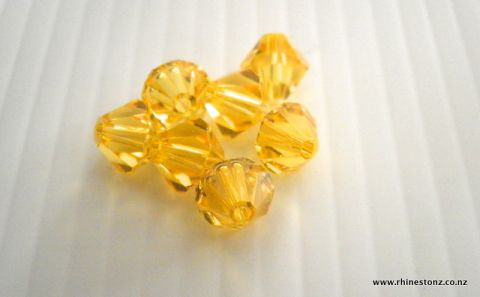 Swarovski Bicone Art 5328 Light Topaz 4mm